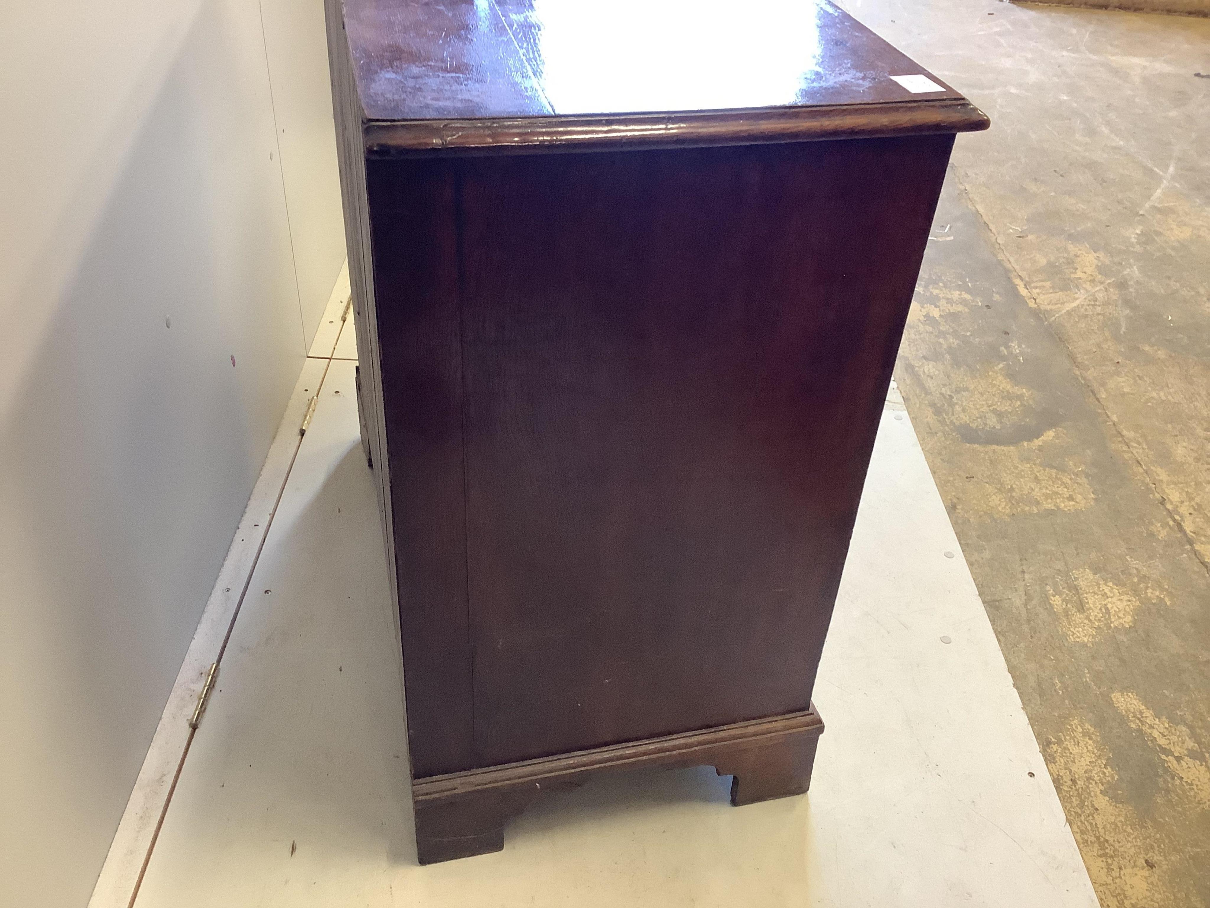 An early 18th century oak chest, fitted with two short and two long drawers, width 91cm, depth 51cm, height 94cm. Condition - fair